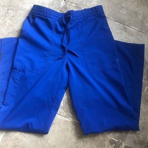 Purple label scrub pants in royal blue size small.